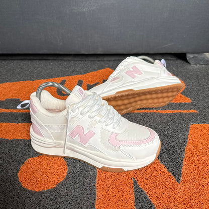 NEW BALANCE MARFIL X ROSADO