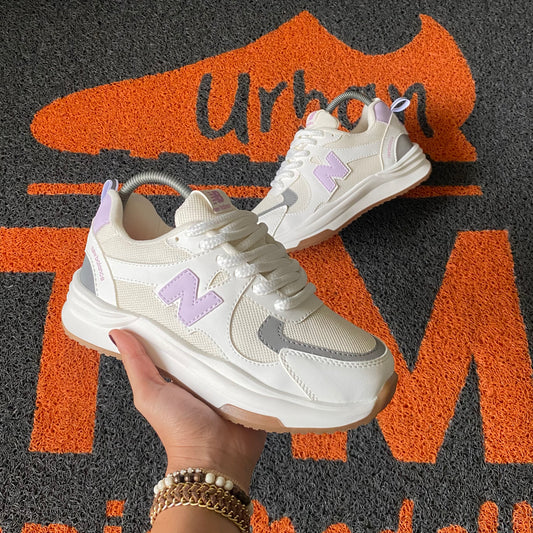 NEW BALANCE MARFIL X LILA