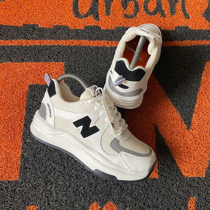 NEW BALANCE MARFIL X NEGRO