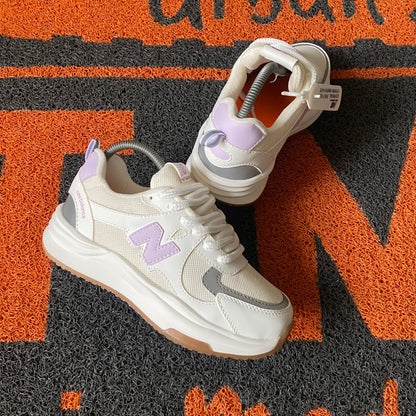 NEW BALANCE MARFIL X LILA