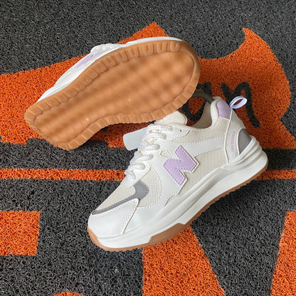 NEW BALANCE MARFIL X LILA