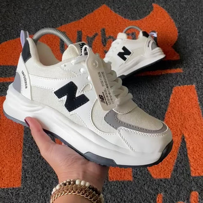 NEW BALANCE MARFIL X NEGRO