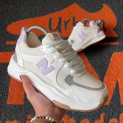 NEW BALANCE MARFIL X LILA